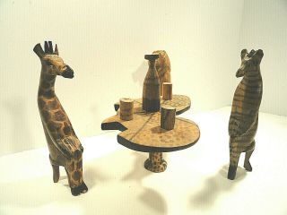 Wooden Carved African Animals Sitting At Table
