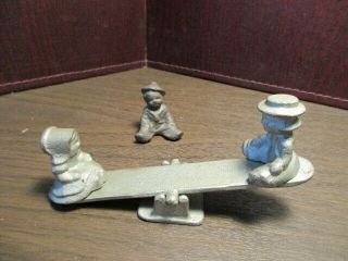 Vintage Cast Iron Amish Boy & Girl On See - Saw - Playground - Doll House