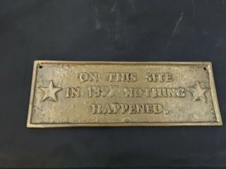 11.  5”x 4” Brass Sign/ Plaque “on This Site In 1897 Nothing Happened”