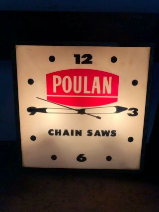 Vintage 1950’s Poulan Chain Saw Lighted Advertising Dealer Clock.