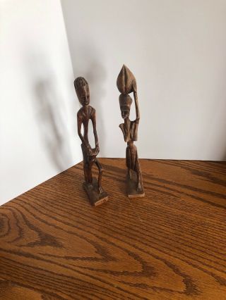African Hand Carved Light Wooden Tall Skinny Man And Woman Figurines Set Of 2