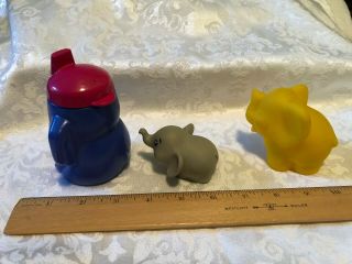 Plastic Sippy Cup,  Rubber Grey Pencil Sharpener,  Yellow Rubber Squeeze Elephant 2
