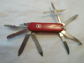 Victorinox Swiss Army Pocket Keychain Knife 8 Tool Small,  Pen & Tweezers,  Red