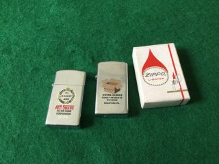 3 Vintage Zippo Slim Lighters,  2 Advertising 1973,  1976,  One Plain 1969