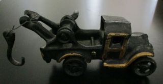 Vintage Black With Gold Trim Cast Iron Toy Tow Truck