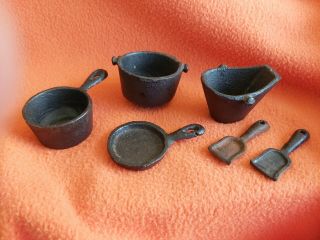 Vintage Cast Iron Miniature Cooking Pots And Coal Bucket With Shovels.
