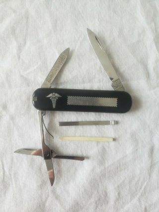 Vtg Victorinox Classic Sd Black Swiss Army Folding Pocket Knife W/medical Logo
