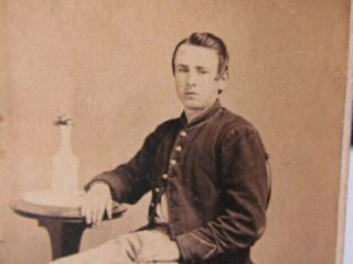 York Pennsylvania Civil War Soldier Sitting By A Table With Flowers Cdv Photo