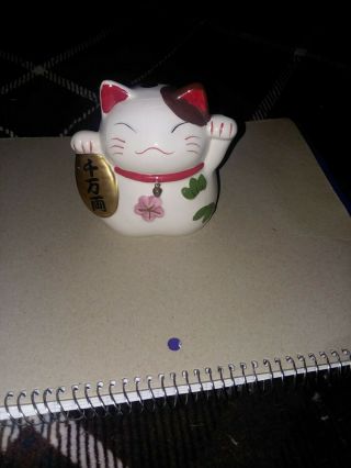 Japanese Good Luck Cat With A Bell And Flower.  So Cute