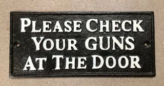" Please Check Your Guns " Sign Plaque Cast Iron Metal Black With White Lettering