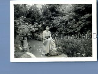 Found B&w Photo G,  5117 Pretty Woman In Dress Posed On Rock Smiling