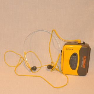 Vtg Sony Walkman Sports Radio Cassette Player Headphones & Radio Yellow