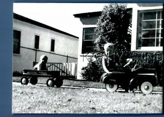 Found B&w Photo H,  6775 Little Boy Sitting In Pedal Car Pulling Other In Wagon