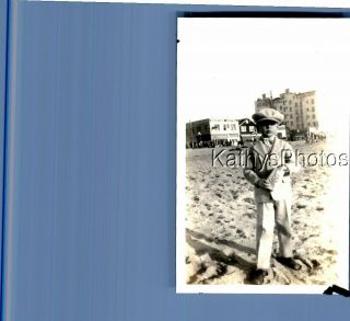 Found B&w Photo C,  5239 Boy In Suit And Hat On Beach With Hands In Pockets