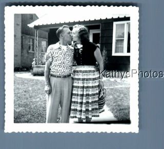 Found B&w Photo N_0828 Man And Woman In Dress Posed Kissing In Yard