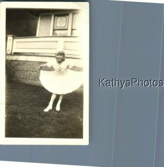 Found B&w Photo K_7607 Little Girl Holding Dress Up In Curtsy