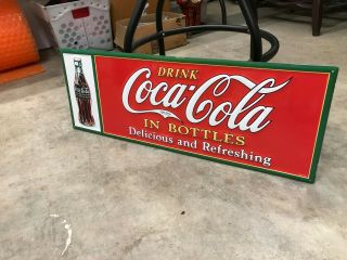 " Coca Cola W/ Bottle " Embossed Metal Advertising Sign,  (28 " X 10 ") Cond