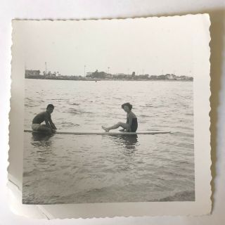 Couple Sitting On Long Board Surfboard On Water Vintage B/w Photo Snapshot