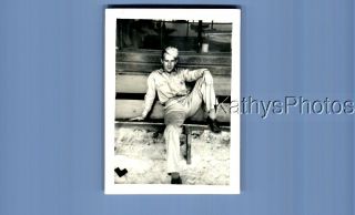 Found B&w Photo F,  5628 Soldier Posed Sitting On Bench In The Snow