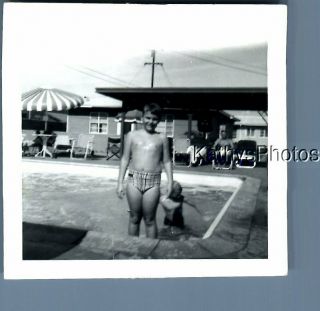 Black & White Photo J_4391 Boy In Swimsuit Posed In Pool With Other
