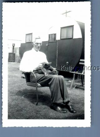 Found B&w Photo F,  6759 Man Sitting In Chair Holding Cat On Lap By Trailer
