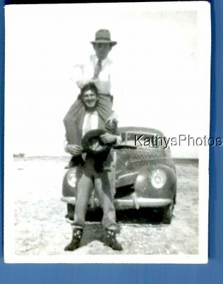 Found B&w Photo F,  6755 Man Posed On Others Shoulders In Front Of Old Car