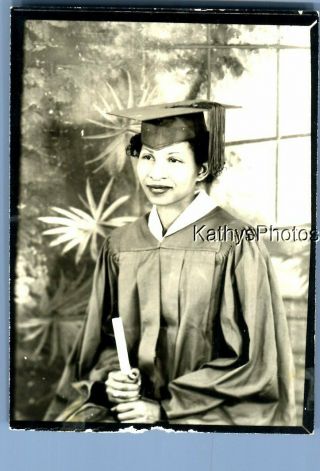 Found B&w Photo A_9652 Pretty Woman In Graduation Cap And Gown Sitting