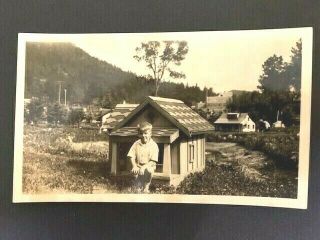 Vintage B & W Photo Of A Giant Child In A Tiny Town