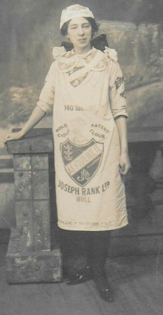 Unposted British RPPC of a Woman in a Joseph Rank Ltd Flour Sack Dress 2