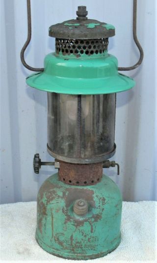 Old Coleman 249 kerosene lantern,  dated 4/47,  burns good,  old mica globe,  orig. 2