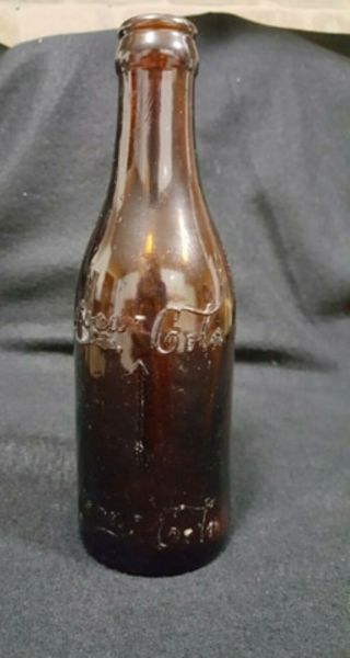 Straight Side - Amber Coca - Cola Bottle With Arrows - - Memphis Tennessee - -