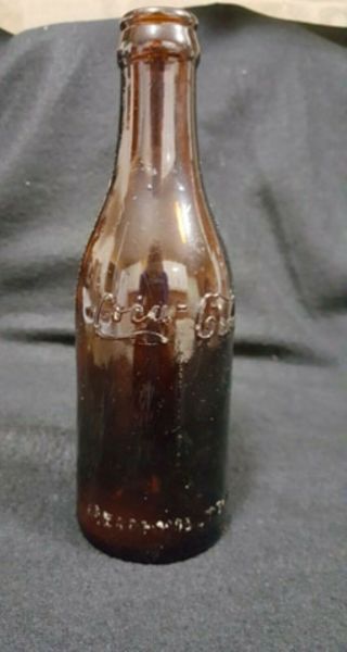 Straight Side - Amber Coca - Cola Bottle with Arrows - - Memphis Tennessee - - 2