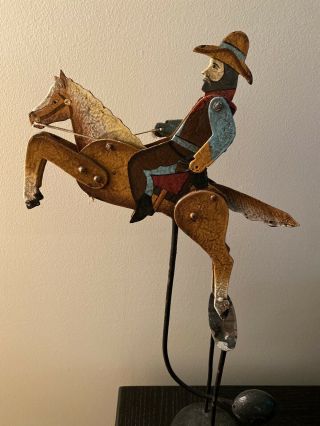 Folk Art Balancing Rocking Horse Cowboy and Indian Cast Iron Pendulum 2