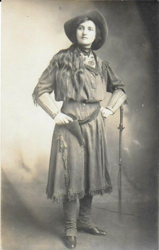 Rppc Of A Woman Dressed As A Cowgirl With Pistol & Long Riding Crop 1920s