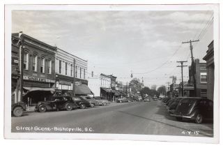 Rppc Street Scene Business Section Of Bishopville,  South Carolina.  Vintage Autos
