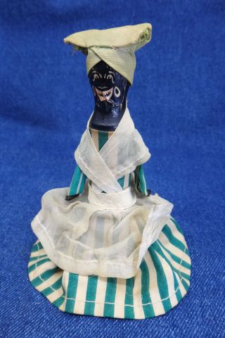 Vintage Primitive Folk Art Dinner Bell Smiling Doll Black Americana Cloth Dress