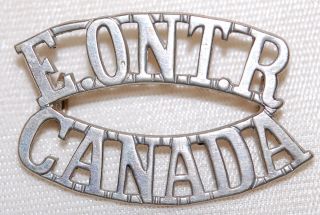 C.  E.  F.  2nd Eastern Ontario Regt Shoulder Title Badge " E.  Ont.  R Over Canada "