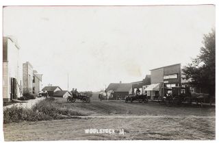 Rppc Main Street And The Business Section In Woolstock,  Iowa Two Vintage Autos
