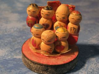 Vintage Handmade Set Of 7 Wooden Mini Kokeshi Dolls On Stand 1 1/2 " Tall