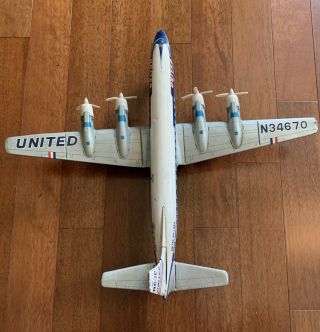Friction Toy Plane Dc - 7c United Airlines Mainliner Tin Japan N34670
