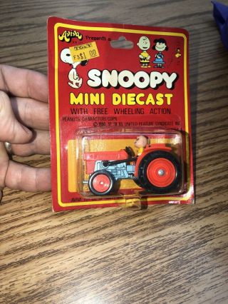 Snoopy Mini Diecast Charlie Brown On A Kubota Tractor Aviva On Card