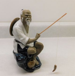 Chinese Mudman Figurine Seated Man With Fishing Pole