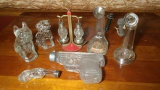 7 Vtg.  Glass Candy Containers Bulldogs,  Guns,  Phones & Lanterns On Anchor.