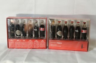 Vintage Evolution Of Coca Cola Contour Bottled Set Of 2