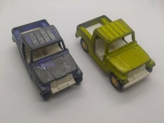 2 Vintage 1969 Tootsie Toy Jeep Trucks Green & Purple Hitch Diecast 3.  5 "