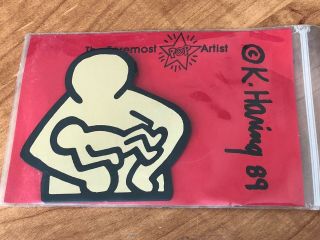 Figure W/ Baby Printed On Brass 1989 By Keith Haring Package