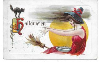 Witch In Red Dress Putting Magic Dust On Broom,  Vintage Halloween Postcard 1910