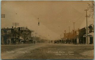 1910s La Crosse,  Kansas Rppc Postcard Main Street North " Cottage Studio Photo "