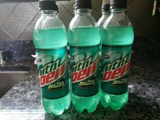 Mountain Dew Baja Blast Bottles 16.  9 Ounce With A 20 Ounce Bonus Bottle