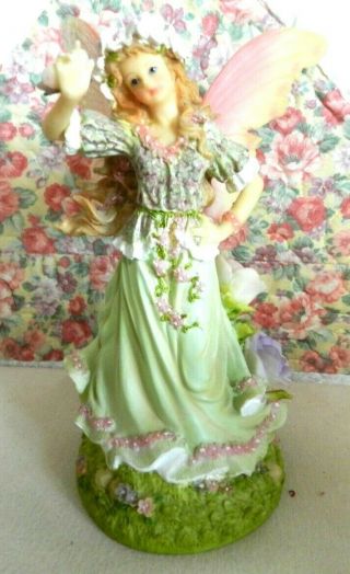 Decorative Fairy,  Music Box,  Spring Flowers,  Pink/yellow Wings,  7 " Tall